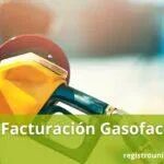Gas pump nozzle inserting into a car's fuel tank. Facturación Gasofac